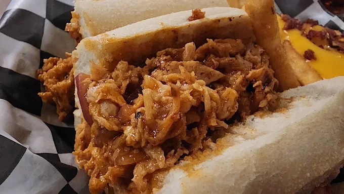 A chicken cheesesteak with loaded fries — a Frogtown favorite