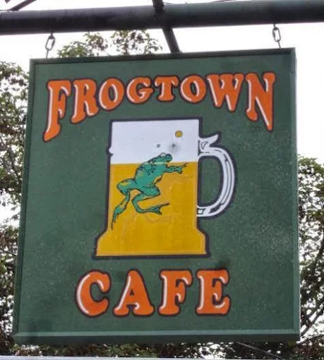 The Frogtown Cafe sign out front — green, with the frog in a mug
